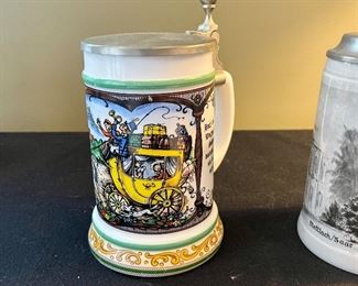 Lot 8372. $60.00 Lot of 3 German covered Beer Steins as shown.