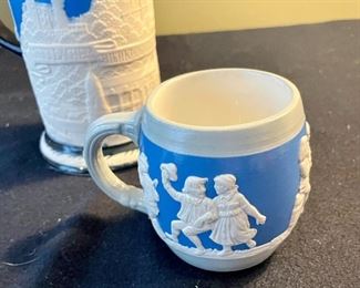 Lot 8373. $80.00. 2 Villeroy & Boch steins in the Jasperware style.
