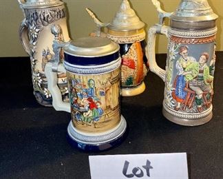 Lot 8374. $60.00 4 German covered Beer steins as shown.