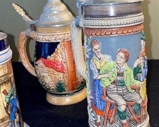 Lot 8374. $60.00 4 German covered Beer steins as shown.