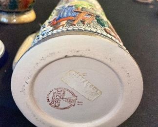 Lot 8374. $60.00 4 German covered Beer steins as shown.