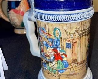 Lot 8374. $60.00 4 German covered Beer steins as shown.