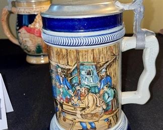 Lot 8374. $60.00 4 German covered Beer steins as shown.