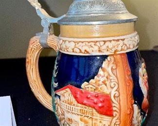 Lot 8374. $60.00 4 German covered Beer steins as shown.