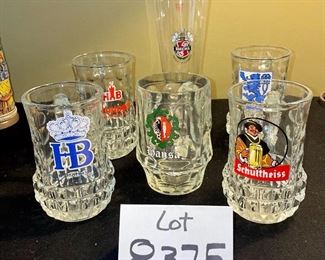 Lot 8375.$48.00 Lot of 5 Glass Mug Beer Steins and 1 Pilsner Glass adorned with Logos for Beer Companies.