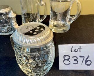 Lot 8376. $40.00 1) Ski Oslo mug 1982, 2) 3 covered, glass beer steins, 3) glass dish/basket with metal handle.