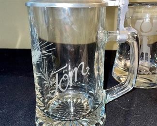Lot 8376. $40.00 1) Ski Oslo mug 1982, 2) 3 covered, glass beer steins, 3) glass dish/basket with metal handle.