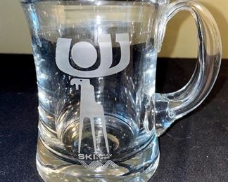 Lot 8376. $40.00 1) Ski Oslo mug 1982, 2) 3 covered, glass beer steins, 3) glass dish/basket with metal handle.