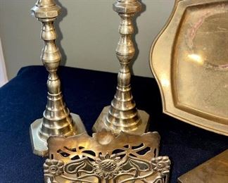 Lot 8377. $50.00 Lot of brass items: 10 tray 14" x 9", 2) brass stand 5" x 5", 3) brass letter/napkin holder 5.5" x 2" x 3" T, 4) pair of brass candle sticks 10" T, 7" candlestick, 5" candlstick, 5). ornament holder 8" T, 6) 4 Northern Lights candles.