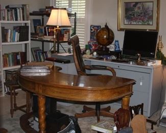 curved desk, books 