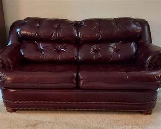 Stylish Broyhill Burgundy 2 Cushion Leather Sofa with Nailhead Trim