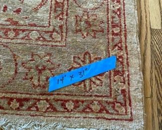 14’ x 31” hand-tied Turkish rug — brought to the home directly from Turkey