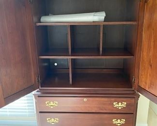 Shelved to use for storage and folded items