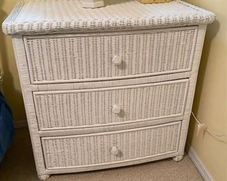 The white wicker is in perfect condition