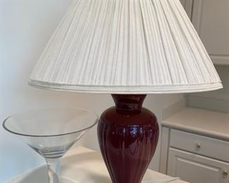 Burgundy ceramic lamp and oversized martini glass