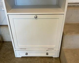 A great dog cabinet- holds feed, leashes and toys