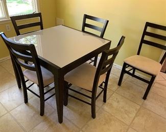 Square Kitchen Table and Chairs. Nice size table! Measures 35.5" x 35.5" x 30"
Comes with six chairs (only five are in the picture) Table was recently purchased and is in very good condition.