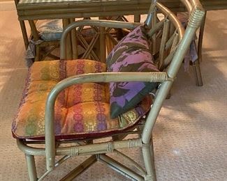 Vintage Dining room table and chairs. The table is believe to be by Ficks and Reed. However; not guaranteed as it does not have a manufacturer's marking.
The glass top on the table has one small chip in one corner. The table measures 6' x 38" x 29". Located in a walk out basement level of the home.