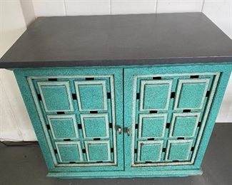 Fun is the best word to describe this cabinet with bright aqua doors! It does have one interior shelf which was not resting on the pegs.
Measures 26" x 15" x 24"