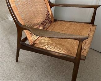 Awesome Mid Century Chair with wood frame and caning seats. Some wear to the caning and needs some repair.
Measures 29.5" h and arm to arm 27"