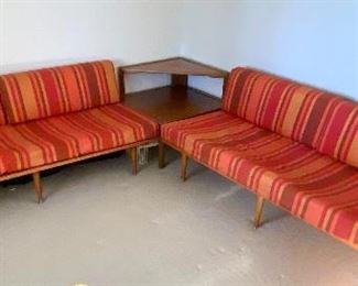AMAZING! Mid Century Corner Sectional. Under the cushions has the name of Sengweb Sagless Construction. Upholstered in a wonderful striped red and orange fabric.
Each side measures about 75" x 30" and the corner table is 43" d x 42" w
The Foam cushions are in as-is condition and will likely need to be replaced