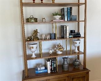 Amazing Mid Century Decorative Shelving Unit. Contents NOT included.
Measures about 50" L x 17" D x 79" H
Winning bidder will need to bring help to move this item as employees are not able to provide lifting/moving assistance. You will need a larger vehicle to transport this item.