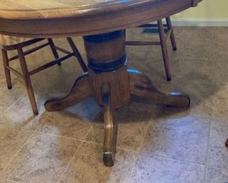 42 Inch Round Oak Dining Table with Four Chairs and 18 Inch Leaf