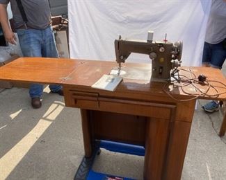 Singer Sewing Machine with a Unique Cabinet