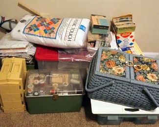 Sewing Notions Including Thread, Portable Sewing Boxes Full Of Thread, Needles, And Buttons, How To Craft Books, Unfinished Patch Quilt, And Fabric