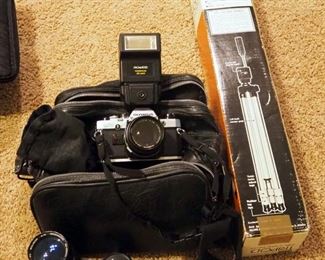 Olympus OM 10 35MM Camera With Additional Lenses, Filters, Tripod, Carry Case And More