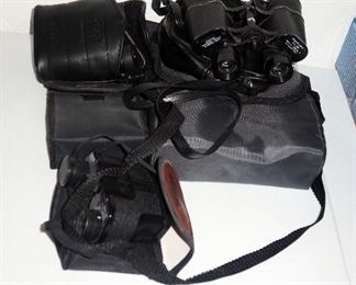 Binocular Assortment Including Wards, Jason Graphite, Model 204, Johnson And Murphy Compact, Nikon, 19 x 25 x26, Bushnell 10 x 50WA, 7 Total 6 In Carrying Cases