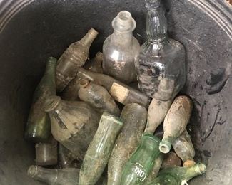 Vintage bottles….OLD AS DIRT and still a little on them.