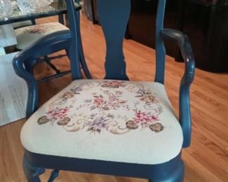 10 chairs with hand sewn seats. Will sell separately.