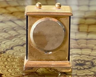 AS-IS Brass Miniature Mantle clock quartz	1.75x1.5x.75in	HxWxD
