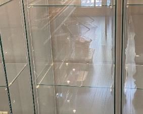 10 Available Contemporary Lighted 4 Shelf Display Case	64.25x16.75x14.5in	HxWxD Priced individually 
