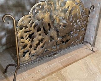 Patinaed Metal Fireplace Screen	28.5 inches high by 39 inches wide28.5 inches high by 39 inches wide	
