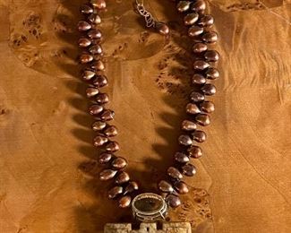 Antique carved jade w 40k Citrine stone/fresh water pearls/14K Gold Clasp	17 Inches Long	
