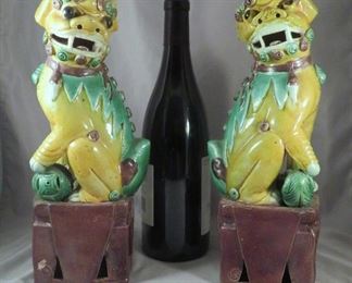 Large matched pair of Chinese foo dog statues