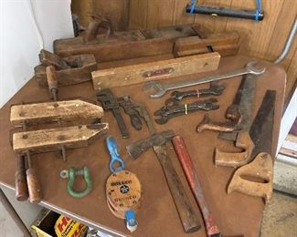 Antique wood planer’s, wood clamps, Pullies,  hammers, saws and wrenches