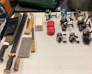 Assorted fishing reels and vintage knives