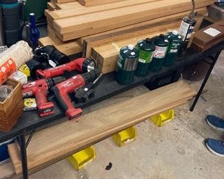 Cut squared and planed oak pieces 4 feet and 6 feet long, propane tanks and battery operated Milwaukee drills and light