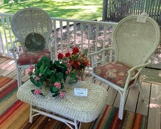 Two matching wicker chairs and table