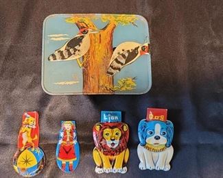 (4) Vintage Tin Toy Clickers + 1 Tin (Whistle?)
The cowgirl, dog, and bear are 1960’s Japanese non-mechanical tin clickers
The dog and ball seems to be a 1950’s Japanese tin whistle
The bird clicker is vintage