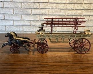 Cast Iron Horse Drawn Fire Ladder Wagon
About 18in long