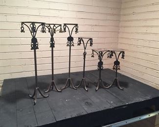 (6) Iron Pillar Candle Holders with Square Tops. Measure 21in, 17in, and 16in