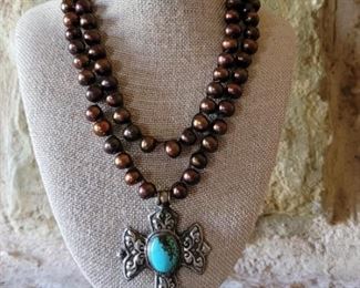 Chocolate pearls w turquoise cross pendant.