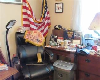 Leather office chair and military memorabilia