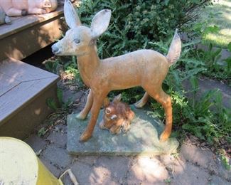 Concrete deer and other garden statues