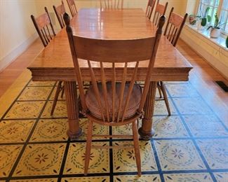 Dining Table and Chairs - 8 chairs. This table is super flexible...there are 7 leaves! As shown, the table is 29" high x 109" wide x 42" deep. Each leaf is 10". This table can drop down to almost square in no time! So many options!