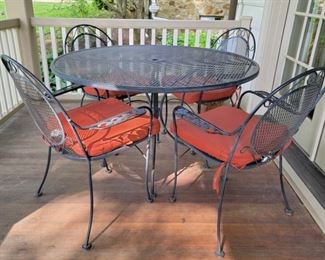 Table - 30" high x 48" diameter; chairs - 35" high x 26" wide x 21" deep